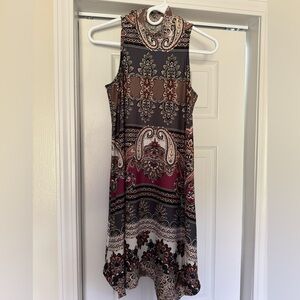 Beautiful sleeveless  dress with deep rich colors.